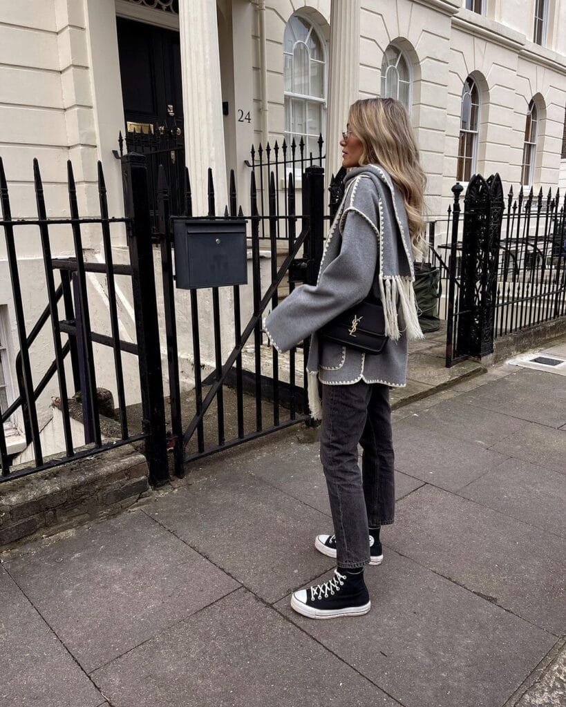 Woman wearing a grey sweater